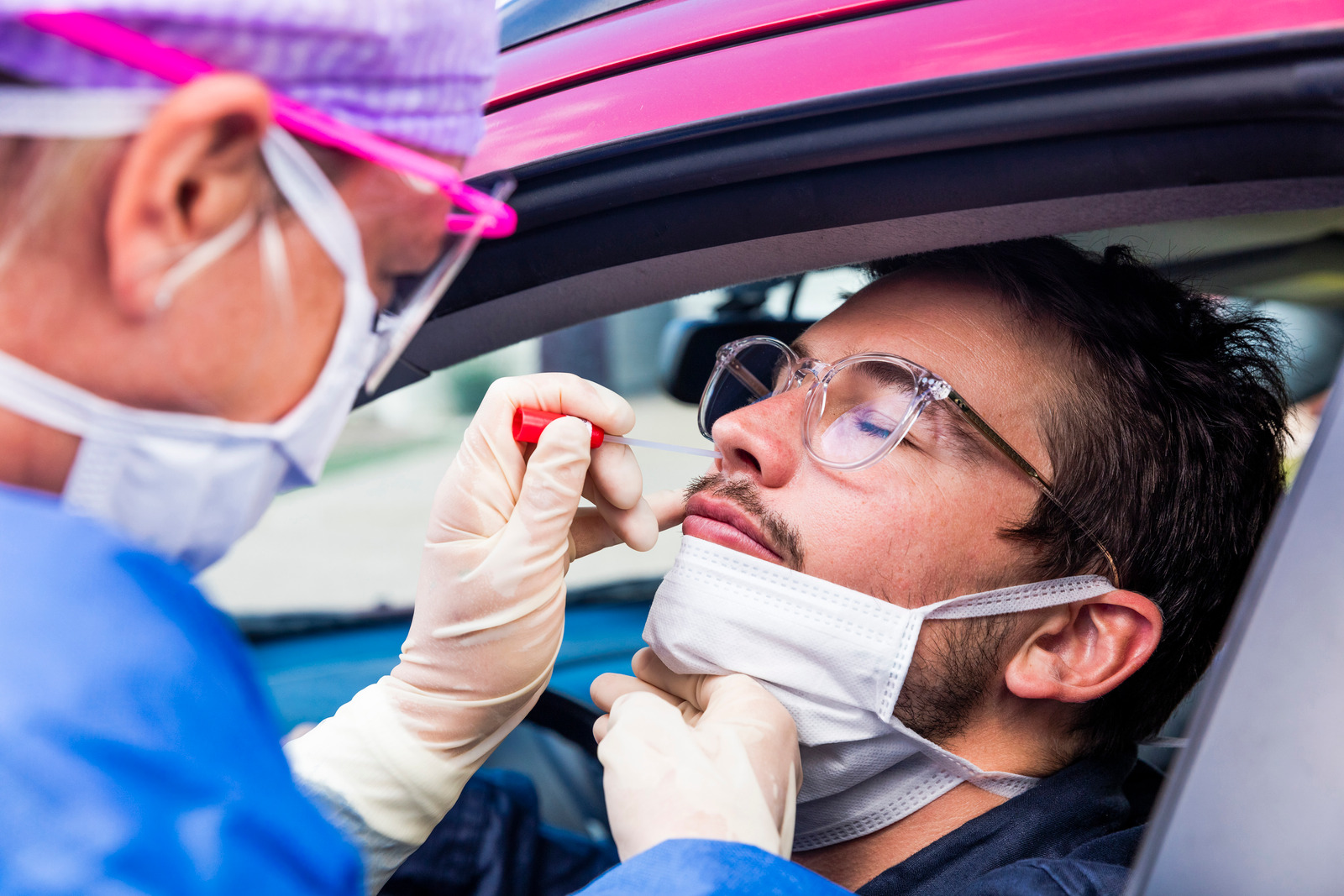 Doctor Taking A Nasal Swab Test