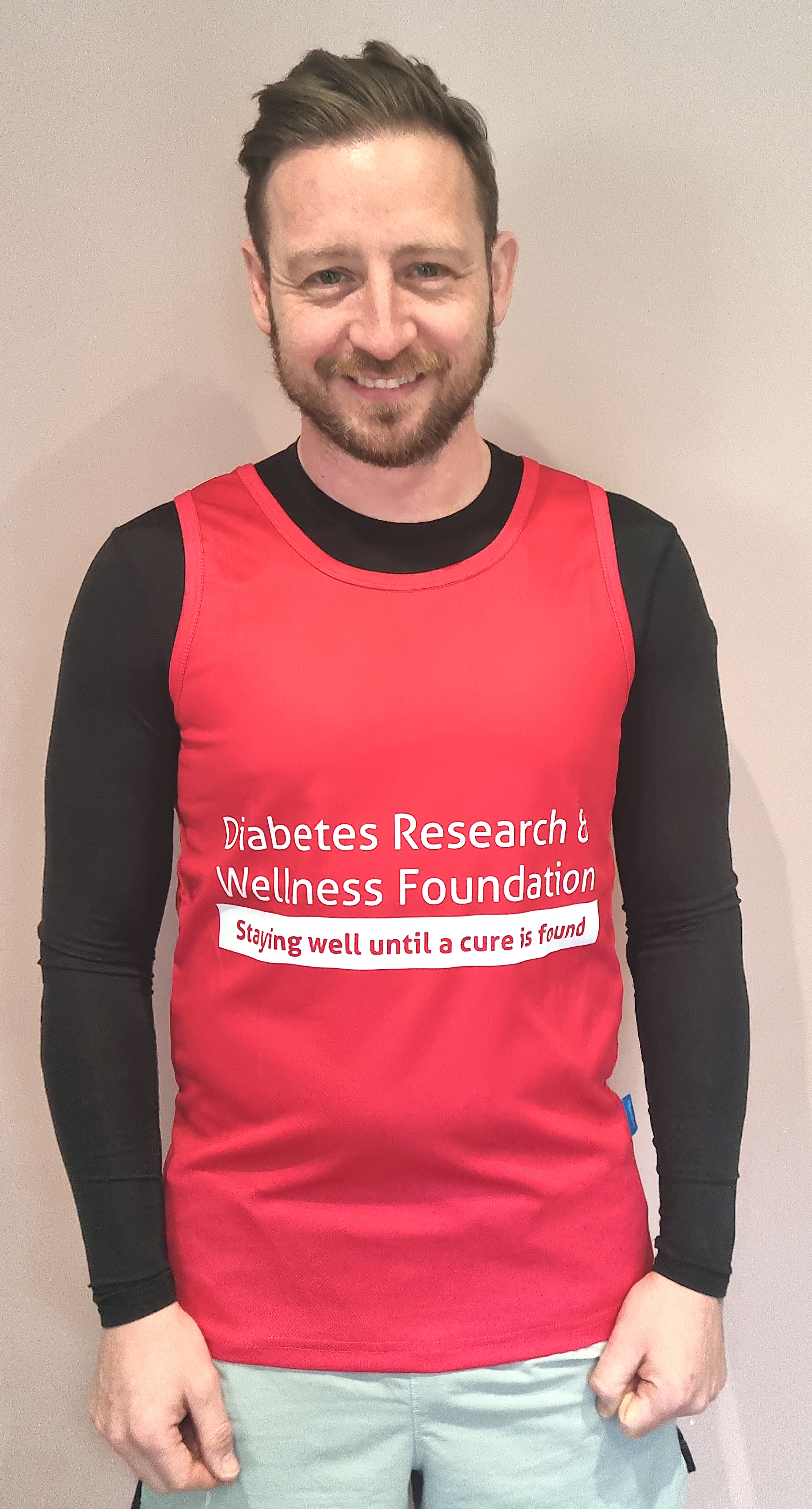 Carl Greaves in his DRWF running vest preparing for the London Marathon.